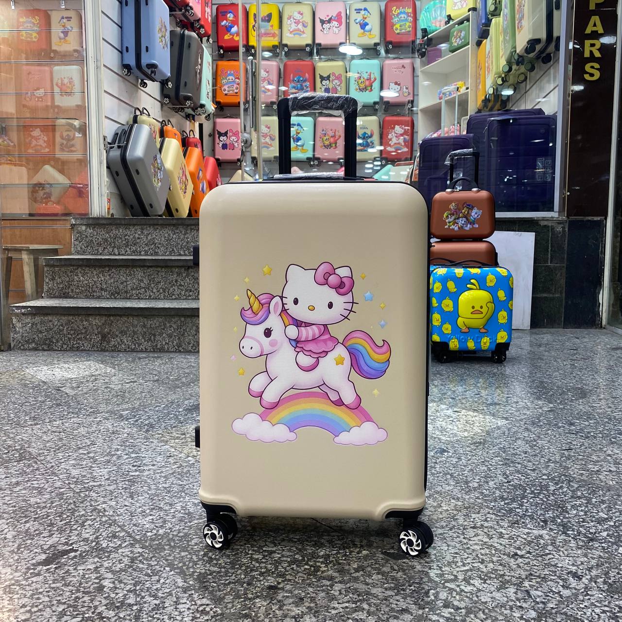 چمدان کودک یونیکورن و کیتی  | سایز 24 | نشکن | ضدخش | کرم