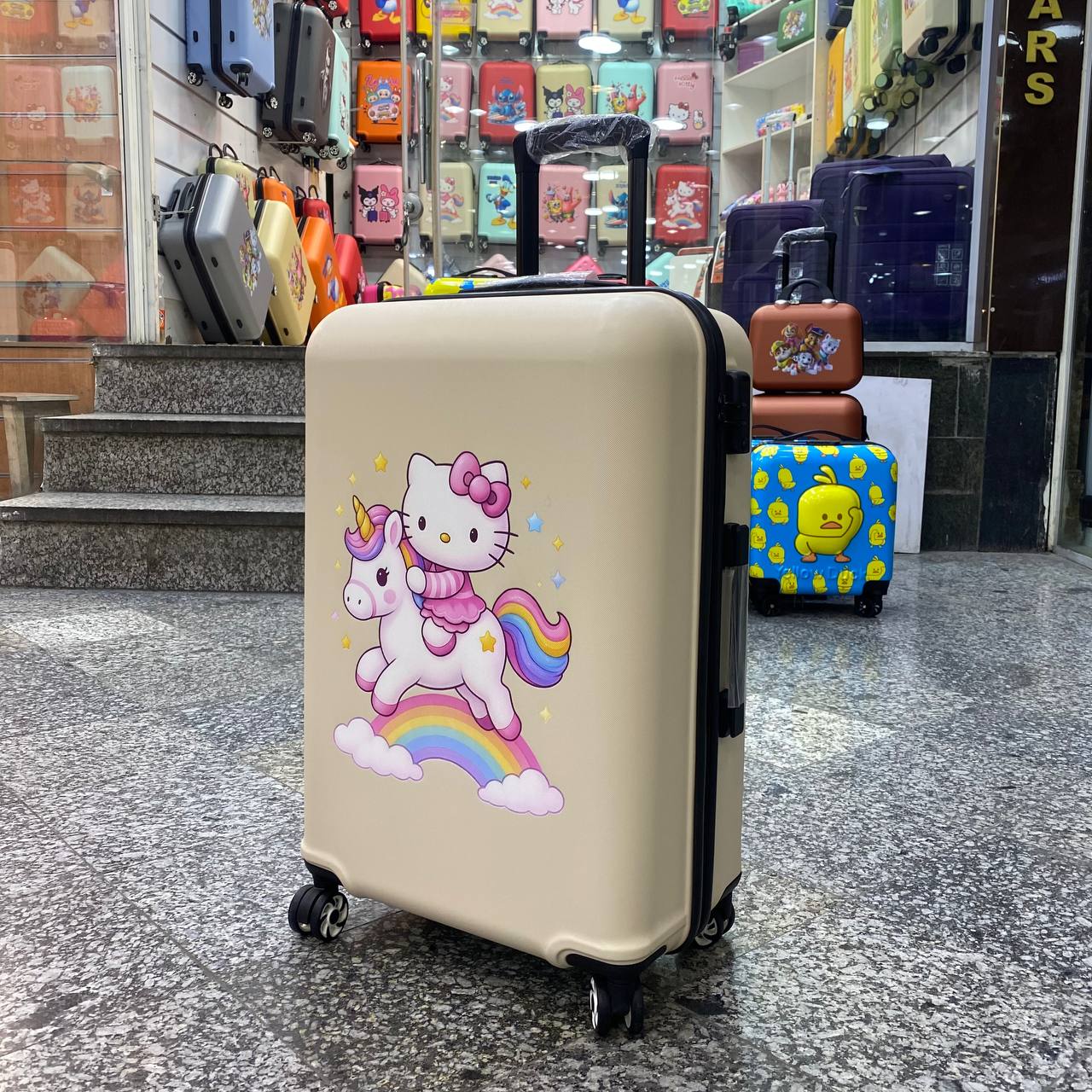 چمدان کودک یونیکورن و کیتی  | سایز 24 | نشکن | ضدخش | کرم