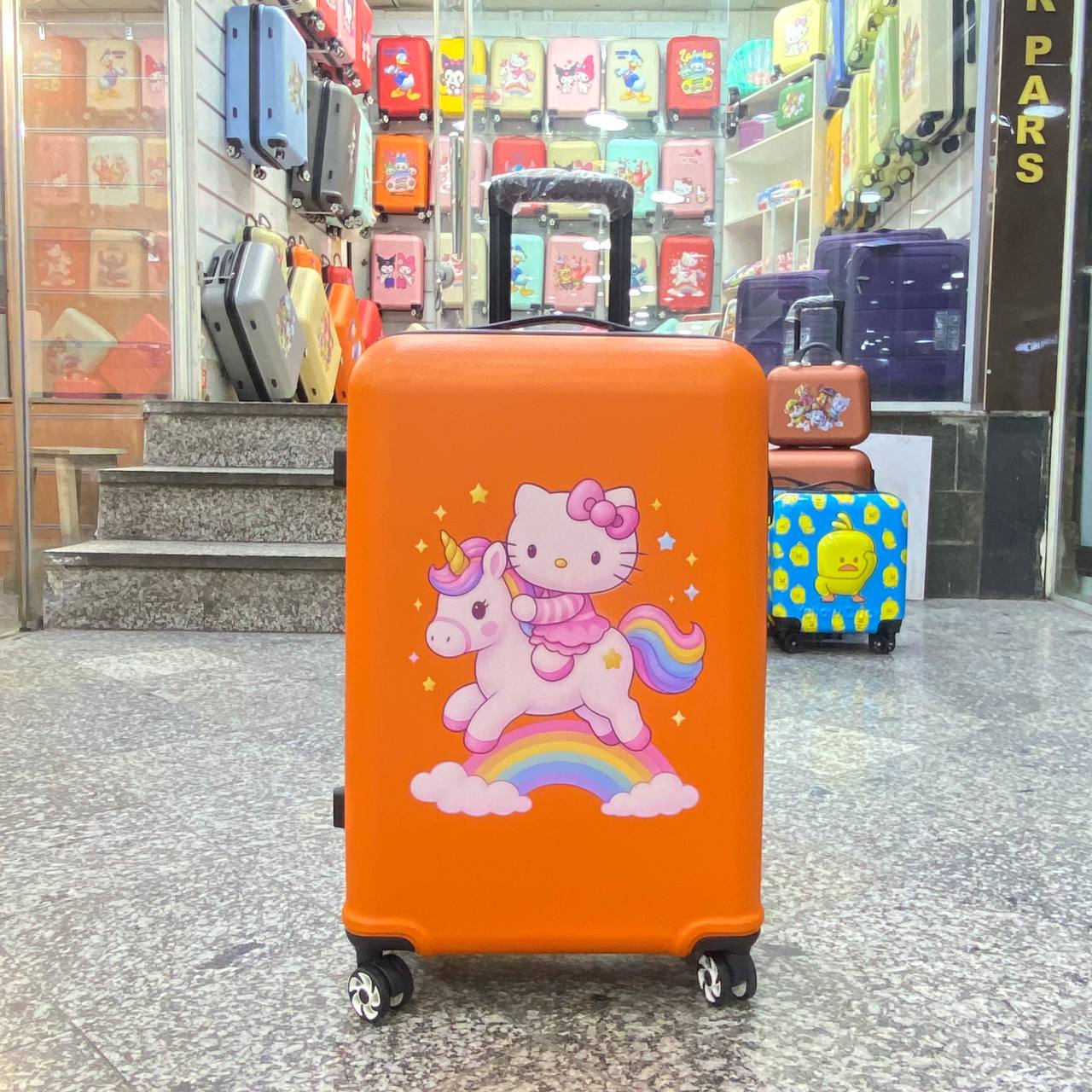 چمدان کودک یونیکورن و کیتی  | سایز 24 | نشکن | ضدخش | نارنجی